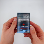 hands holding a pack of Canadian Classics Original cigarettes