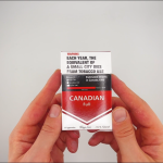 hands holding a pack of Canadian Full cigarettes