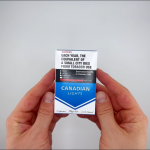 hands holding a pack of Canadian Lights cigarettes