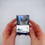 hands holding a pack of Playfares Light cigarettes