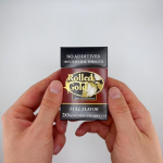 hands holding a pack of Rolled Gold Full cigarettes