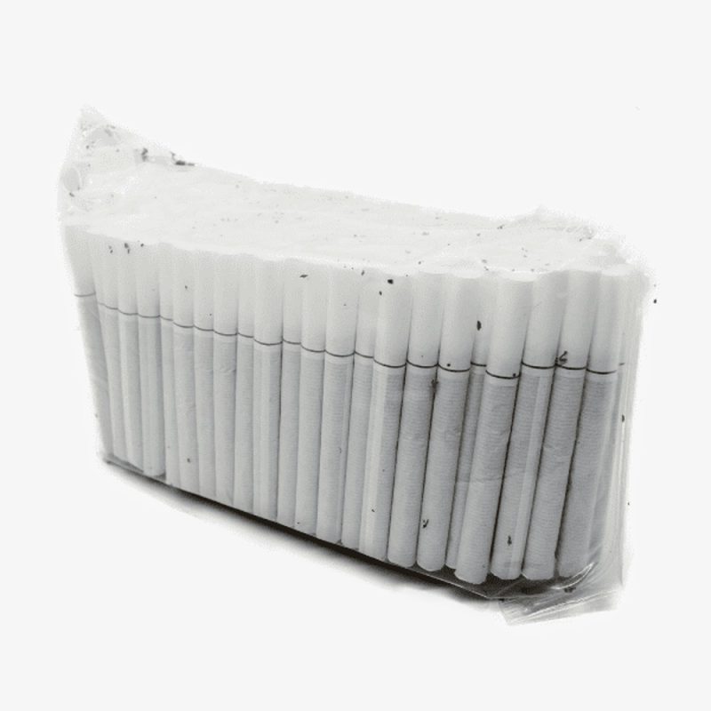 Row of white cigarettes tightly packed in a sealed plastic wrap, standing upright in a rectangular bundle